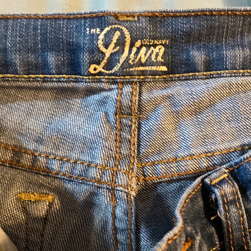 Distressed straight legged jeans